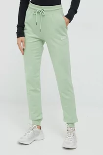Spodnie damskie - Roxy spodnie dresowe 6104620000 damskie kolor zielony z aplikacją - grafika 1