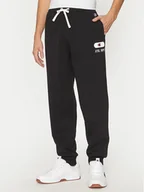 Spodnie sportowe męskie - Champion Spodnie dresowe 220434 Czarny Loose Fit - miniaturka - grafika 1