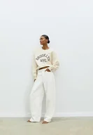 Bluzy damskie - Stradivarius Bluza haftowana Szary XL - miniaturka - grafika 1