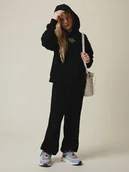 Spodnie i spodenki dla dziewczynek - 4F Spodnie dresowe z szerokimi nogawkami dziewczęce - czarne 158/164 (12-14 lat) - miniaturka - grafika 1