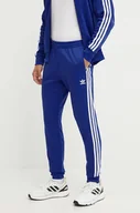 Spodnie męskie - adidas Originals spodnie dresowe Adicolor Classics SST Track Pants kolor niebieski z aplikacją IY9861 - miniaturka - grafika 1