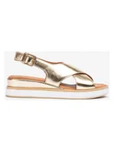 Sandały damskie - Unisa Skórzane sandały w kolorze złotym na koturnie - miniaturka - grafika 1