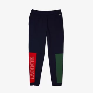 Spodnie męskie - Lacoste Męskie joggery z mieszanki bawełnianego polaru w kolorowe wzory - grafika 1