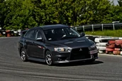 Czasopisma - Jazda Mitsubishi Lancer EVO X po torze - miniaturka - grafika 1