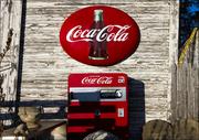 Plakaty - A vintage Coca-Cola sign and Coke machine outside the John E., Carol Highsmith - plakat 59,4x42 cm - miniaturka - grafika 1