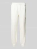 Spodnie sportowe męskie - Spodnie dresowe o kroju tapered z czystej bawełny - miniaturka - grafika 1