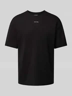 Koszulki męskie - T-shirt o kroju oversized z nadrukiem z logo - miniaturka - grafika 1