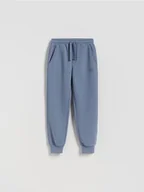 Spodnie i spodenki dla chłopców - Reserved - Joggery z bawełną - granatowy - miniaturka - grafika 1