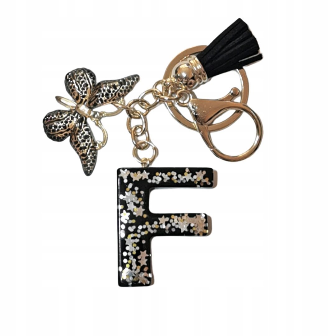 Brelok z literą F - elegancki czarny design z motylem