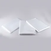 Peleryny fryzjerskie - Jednorazowe peleryny fryzjerskie bezbarwne 50szt. - miniaturka - grafika 1