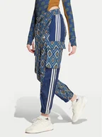 Spodnie sportowe damskie - adidas Spodnie dresowe FARM Rio Premium IV9760 Granatowy Loose Fit - miniaturka - grafika 1