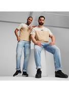 Koszulki męskie - Puma Koszulka "ESS+" w kolorze beżowym - miniaturka - grafika 1