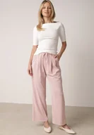 Spodnie damskie - Różowe Szerokie Spodnie z Bawełną Wiskozą Gumką w Pasie i Sznurkiem Iridara - miniaturka - grafika 1