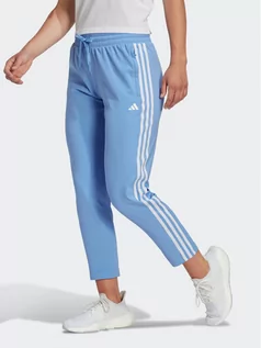 Spodnie sportowe damskie - adidas Spodnie dresowe AEROREADY Made4Training 7/8 Knit 3-Stripes Tapered Joggers HR7828 Niebieski Regular Fit - grafika 1