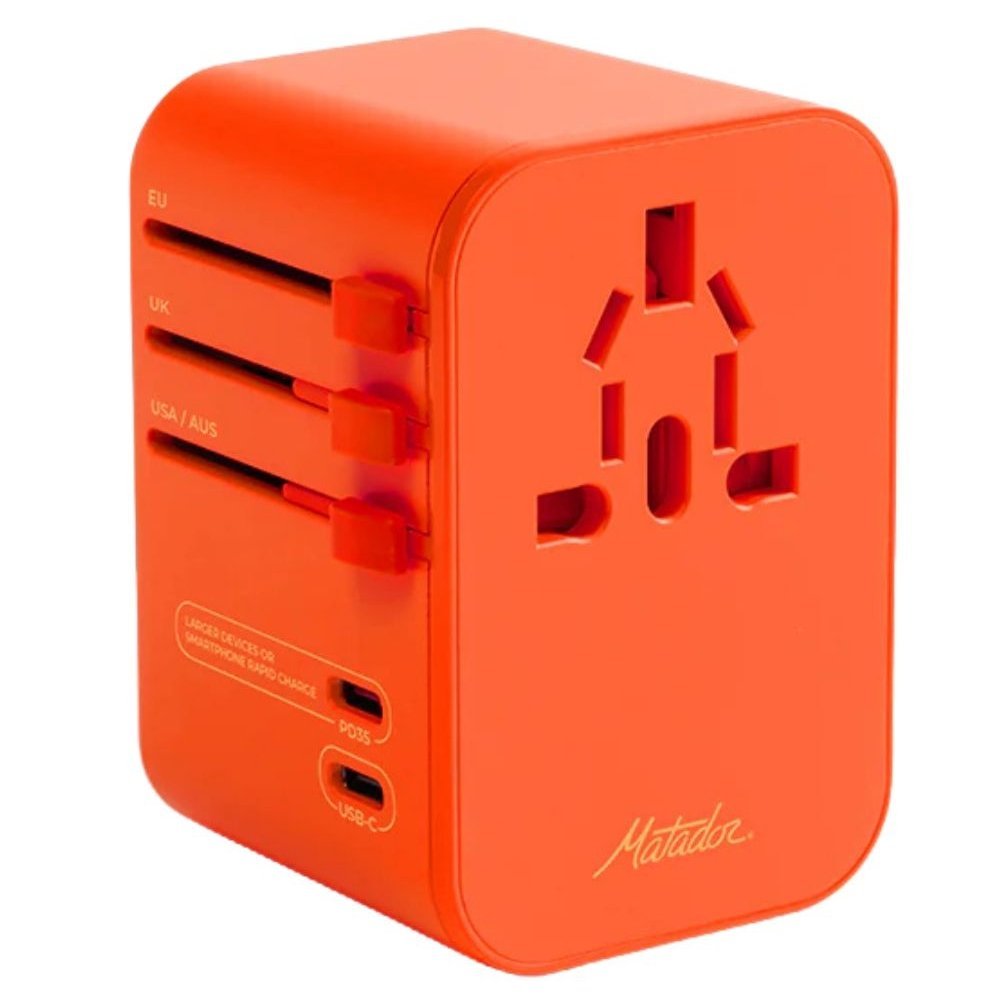 Adapter podróżny do ładowania Matador Global Travel Adapter Forget me not orange