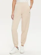 Spodnie sportowe damskie - Guess Spodnie dresowe V5RB11 KCAY2 Beżowy Regular Fit - miniaturka - grafika 1
