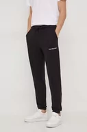 Spodnie męskie - Calvin Klein Jeans spodnie dresowe bawełniane kolor czarny gładkie - miniaturka - grafika 1