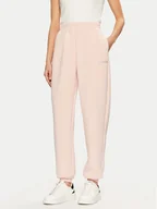 Spodnie sportowe damskie - Guess Spodnie dresowe V4BB13 K7UW2 Różowy Regular Fit - miniaturka - grafika 1