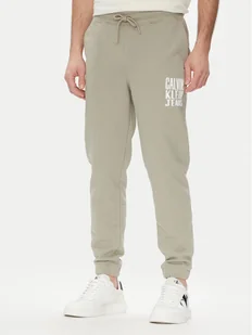 Calvin Klein Jeans Spodnie dresowe Painted J30J327535 Zielony Regular Fit - Spodnie sportowe męskie - miniaturka - grafika 1