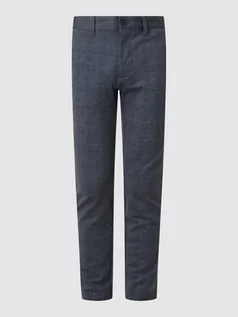 Spodnie męskie - Spodnie o kroju tapered fit z dodatkiem streczu model ‘Mark’ - grafika 1
