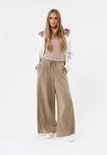 Spodnie sportowe damskie - Beżowe, luźne spodnie dresowe N-MOCK - miniaturka - grafika 1
