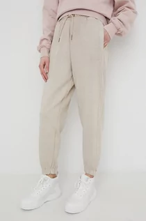 Spodnie damskie - KARL Kani Kani spodnie dresowe bawełniane kolor beżowy gładkie - grafika 1