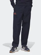 Spodnie sportowe męskie - adidas Spodnie dresowe Adventure Ride HK4979 Granatowy Loose Fit - miniaturka - grafika 1