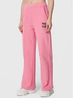 Spodnie sportowe damskie - Femi Stories Spodnie dresowe Flare Różowy Relaxed Fit - miniaturka - grafika 1