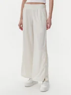 Spodnie sportowe damskie - Puma Spodnie dresowe Ess 629804 Beżowy Wide Leg - miniaturka - grafika 1