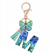 Breloki - Breloczek z literką M i motylem - elegancki dodatek - miniaturka - grafika 1