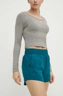 Spodenki damskie - Under Armour szorty treningowe Flex kolor zielony gładkie high waist - miniaturka - grafika 1