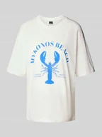 Koszulki i topy damskie - T-shirt o kroju oversized z nadrukiem z motywem i okrągłym dekoltem - miniaturka - grafika 1