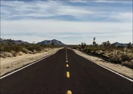 Plakaty - A very long and very brown road in the Mojave National Preserve in California, Carol Highsmith - plakat 29,7x21 cm - miniaturka - grafika 1