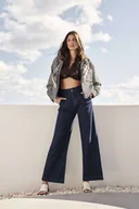 Spodnie damskie - Jeansy dzwony z wysokim stanem-XS - miniaturka - grafika 1