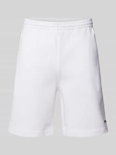 Szorty z dzianiny dresowej o kroju regular fit z naszywką z logo - Spodnie sportowe męskie - miniaturka - grafika 1