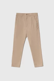 Spodnie i spodenki dla dziewczynek - Tommy Hilfiger jeansy kolor beżowy gładkie - grafika 1