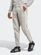 Spodnie sportowe męskie - adidas Spodnie dresowe w kolorze szarym - miniaturka - grafika 1