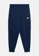 Dresy męskie - Spodnie dresowe męskie Nike Sportswear Cargo granatowe CZ9954-410 r. S - miniaturka - grafika 1