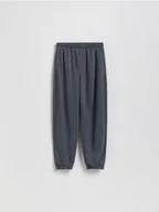 Spodnie i spodenki dla chłopców - Reserved - Bawełniane spodnie jogger - granatowy - miniaturka - grafika 1