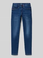 Spodnie i spodenki dla dziewczynek - Jeansy o kroju slim fit z mieszanki bawełny ze szwami w kontrastowym kolorze model ‘SURI’ - miniaturka - grafika 1