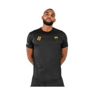 Kimona, stroje i obuwie - Venum x Ares 2.0 Koszulka Techniczna Dry-Tech Black/Gold - miniaturka - grafika 1