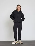 Spodnie sportowe damskie - BGN Spodnie dresowe w kolorze czarnym - miniaturka - grafika 1