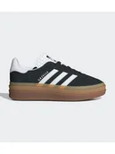 Trampki damskie - adidas Skórzane sneakersy "Gazelle" w kolorze czarnym - miniaturka - grafika 1