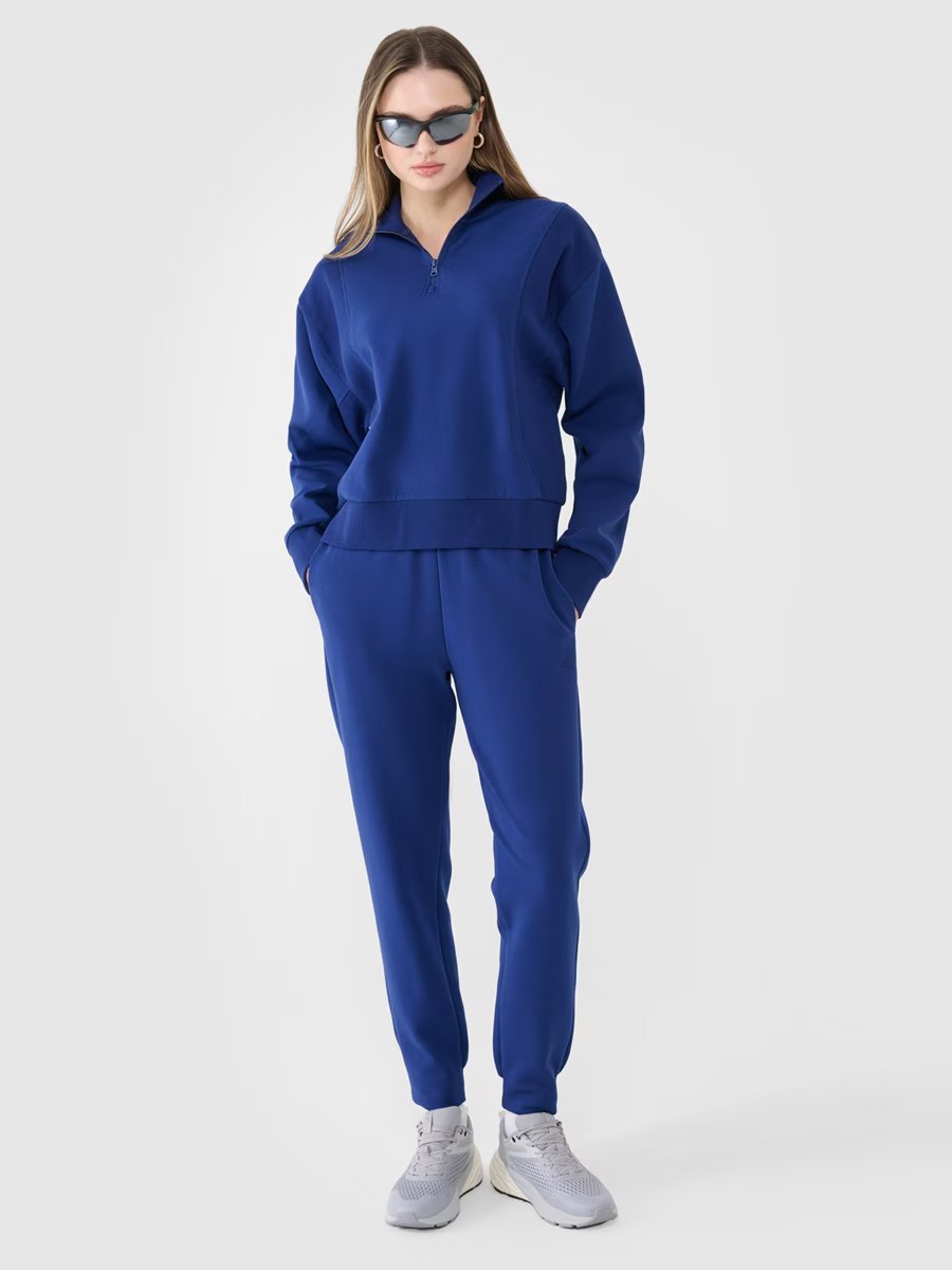 4F Spodnie dresowe joggery damskie 4FWSS25TTROF0996-30S Niebieski Roz. L