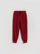 Spodnie i spodenki dla chłopców - Reserved - Dzianinowe joggery - czerwony - miniaturka - grafika 1