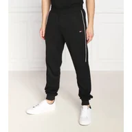 Dresy męskie - Tommy Sport Spodnie dresowe | Regular Fit - miniaturka - grafika 1