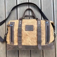 Torby podróżne - Brązowa torba podróżna ze skóry i bawełny woskowanej. - miniaturka - grafika 1