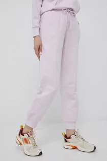 Spodnie damskie - Puma spodnie bawełniane damskie kolor fioletowy z nadrukiem - grafika 1