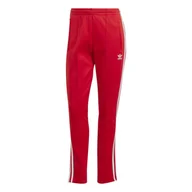 Dresy damskie - Spodnie dresowe damskie adidas ADICOLOR CLASSIC SST czerwone IK6603-L - miniaturka - grafika 1