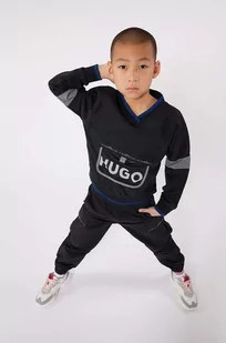 HUGO spodnie dziecięce kolor granatowy gładkie - Hugo - Spodnie i spodenki dla chłopców - miniaturka - grafika 1
